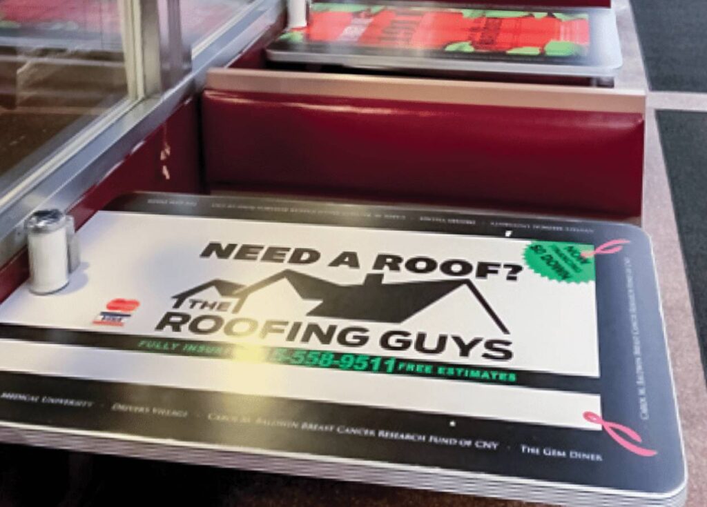 A sign that says " need a roof ? the roofing guys 2 0 1 7 new adventures ".